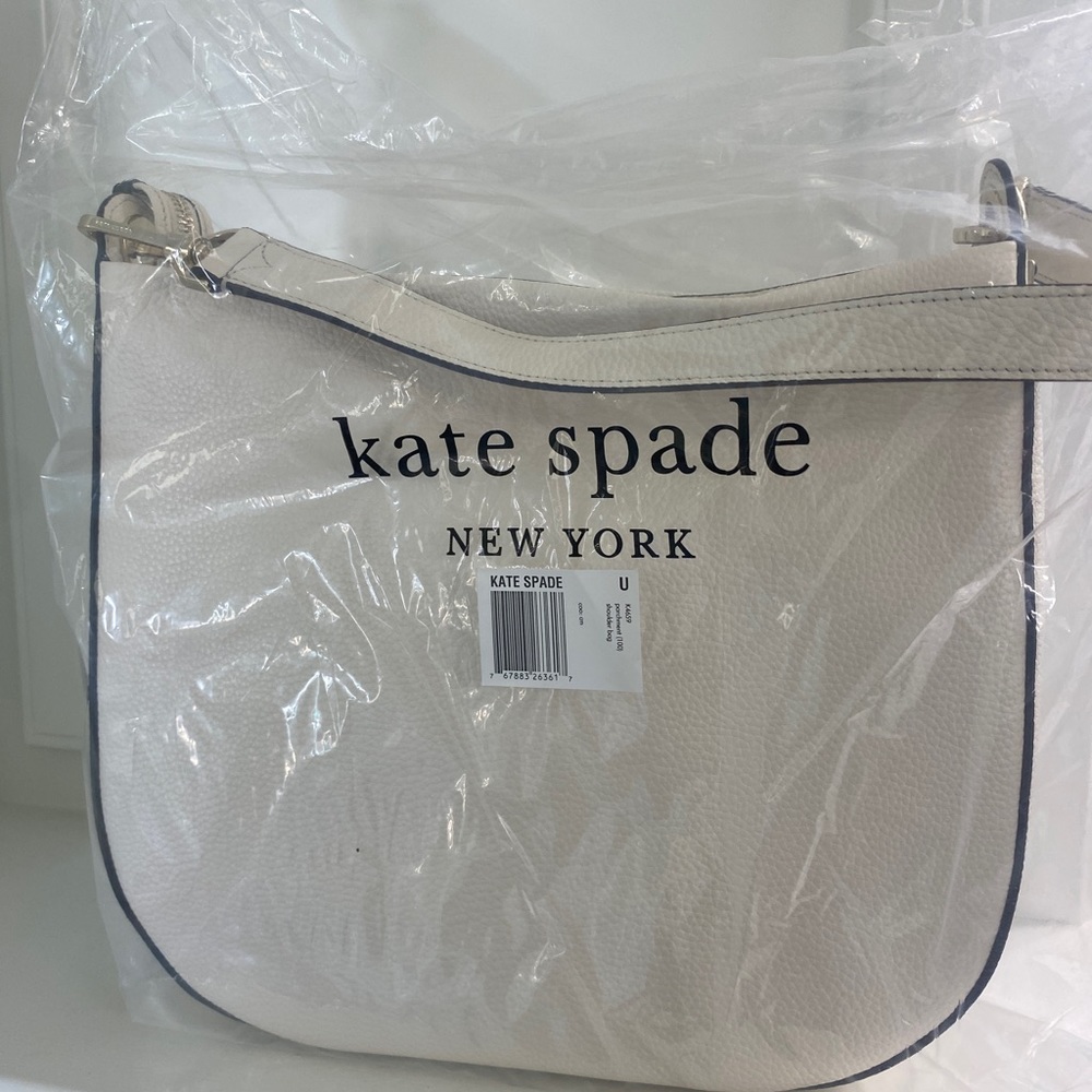 Worn once, beautiful white Kate Spade purse!